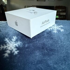 Apple AirPods with active noise cancellation.